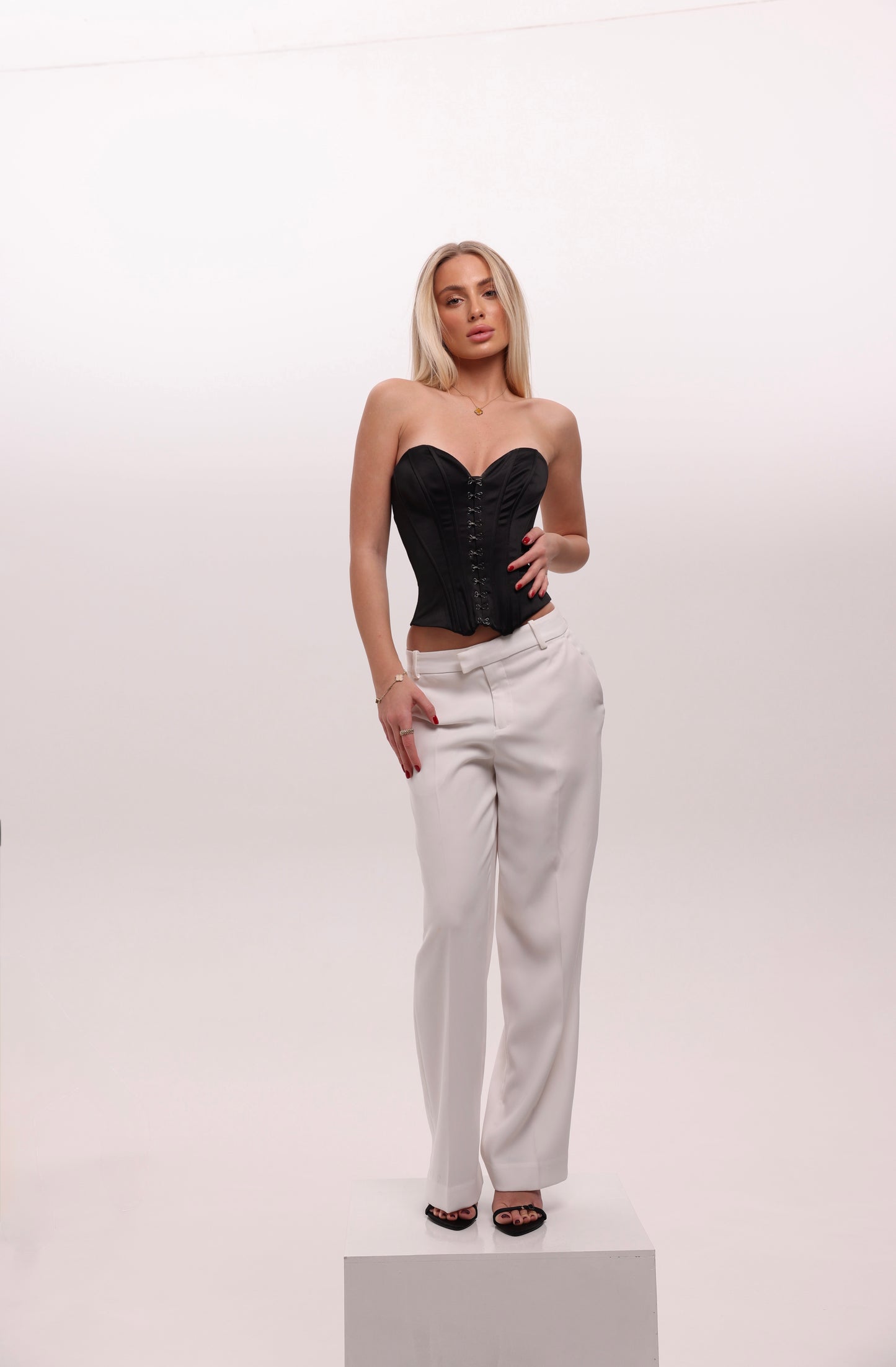 Satin corset with clasps